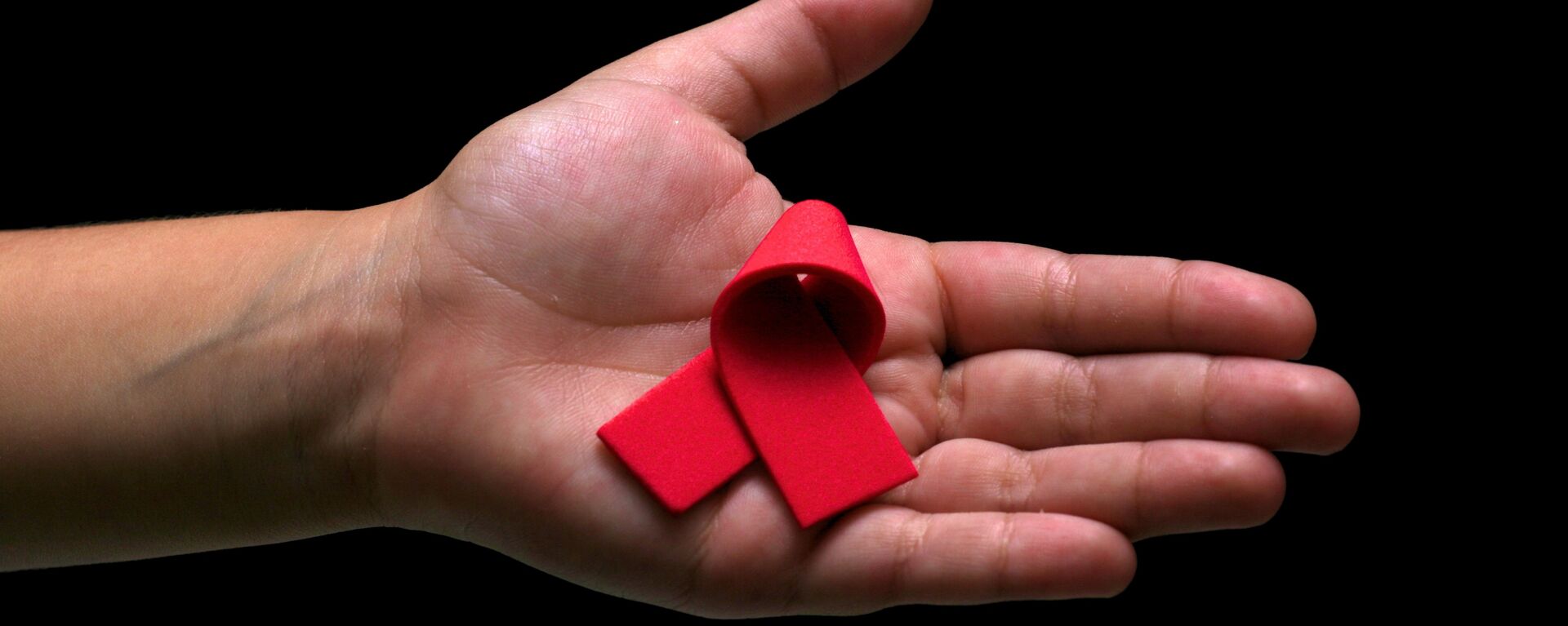 El lazo rojo, símbolo de la lucha contra el VIH y el SIDA  - Sputnik Mundo, 1920, 30.03.2021