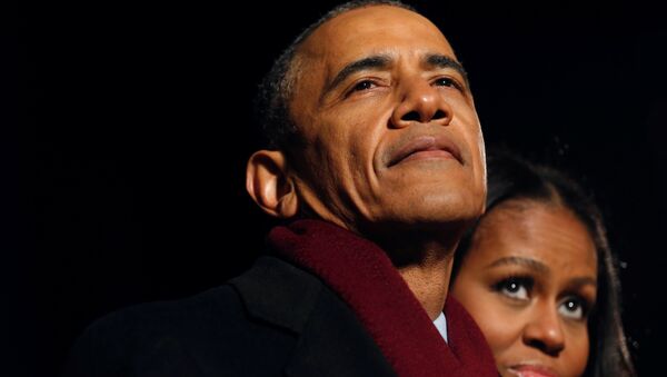 Barack Obama, presidente de EEUU, junto con su esposa Michelle - Sputnik Mundo