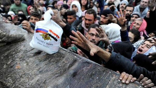 Sirios liberados reciben ayuda rusa - Sputnik Mundo