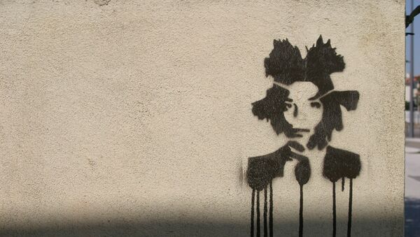 Un grafiti con el retrato de Basquiat - Sputnik Mundo