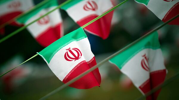 Iran's national flags are seen on a square in Tehran, Iran February 10, 2012 - Sputnik Mundo