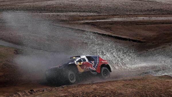 Peugeot's French driver Stephane Peterhansel and co-driver Jean Paul Cottret compete during the Stage 7 of the Dakar Rally 2016 from Uyuni, Bolivia to Salta, Argentina - Sputnik Mundo