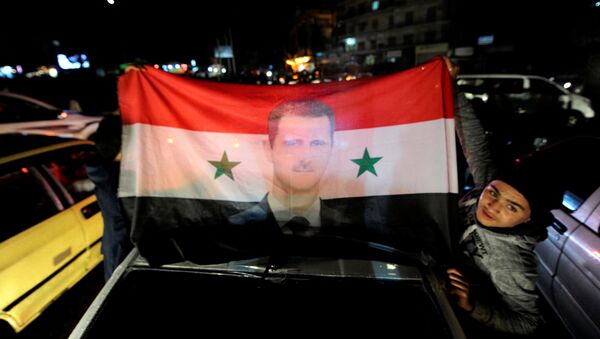 Partidarios del Gobierno sirio - Sputnik Mundo