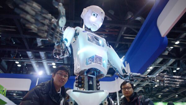 Un robot demonstrado en una feria robótica en China (archivo) - Sputnik Mundo