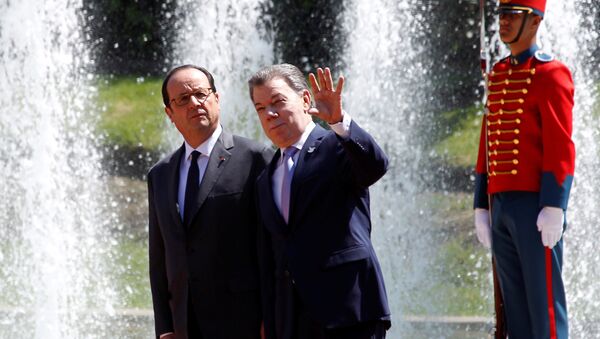 Francois Hollande, presidente de Francia, y Juan Manuel Santos, presidente de Colombia - Sputnik Mundo
