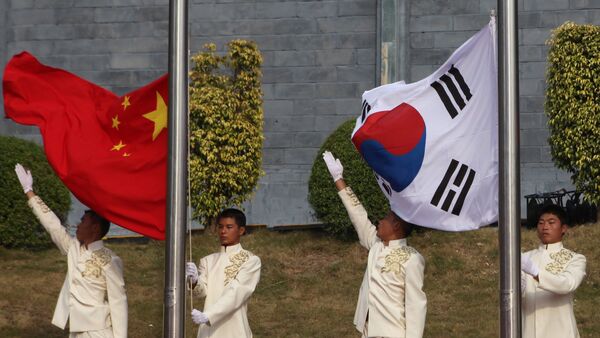 Banderas de China y Corea del Sur - Sputnik Mundo