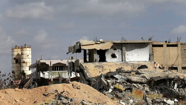 A destroyed building is seen in Ganfouda district in Benghazi, Libya - Sputnik Mundo