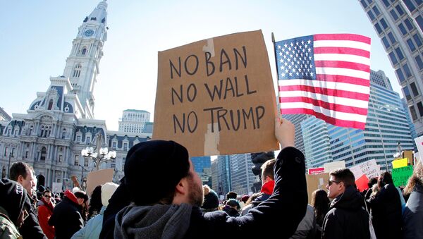 Protestas contra el decreto migratorio de Donald Trump - Sputnik Mundo
