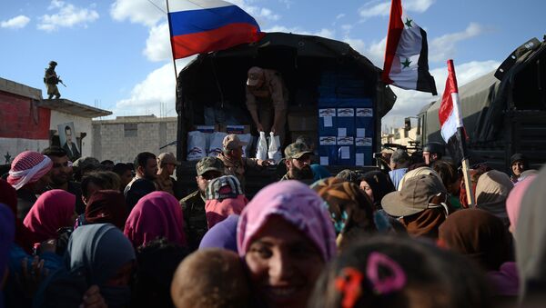 Entrega de ayuda humanitaria rusa a la población siria (archivo) - Sputnik Mundo
