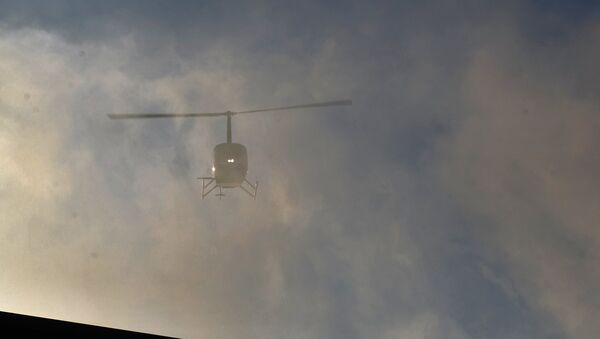 Un helicóptero (imagen referencial) - Sputnik Mundo