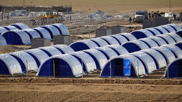 A newly built refugee camp is pictured in Hammam Ali, south of Mosul, Iraq - Sputnik Mundo
