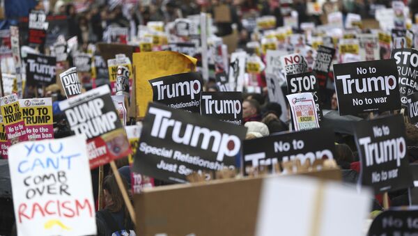 Una protesta contra el veto migratorio de Trump (archivo) - Sputnik Mundo