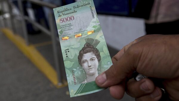 Billetes de bolívares venezolanos (archivo) - Sputnik Mundo