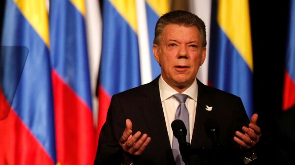 Colombia's President Juan Manuel Santos gives his speech after signing a new peace accord with Marxist FARC rebel leader Rodrigo Londono, known as Timochenko, in Bogota, Colombia November 24, 2016. - Sputnik Mundo