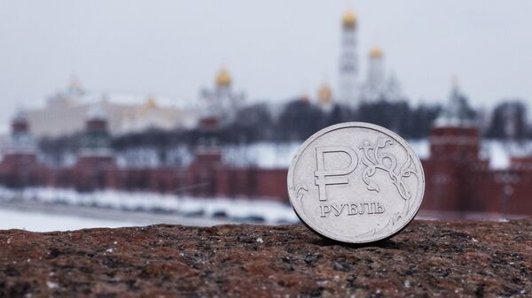 Un rublo ruso - Sputnik Mundo