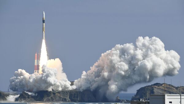 A H-IIA rocket, carrying a government's information gathering radar satellite, lifts off from the launching pad at Tanegashima Space Center on the Japanese southwestern island of Tanegashima, Japan, in this photo taken by Kyodo March 17, 2017 - Sputnik Mundo
