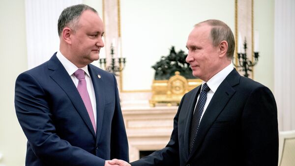 Ígor Dodon, presidente de Moldavia, y Vladímir Putin, presidente de Rusia, durante el encuentro el 17 de marzo 2017 - Sputnik Mundo