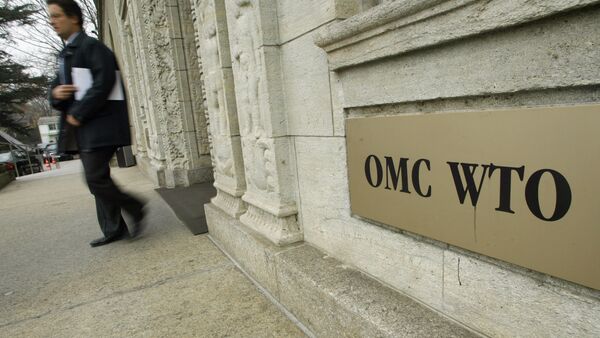 A person gets out of the World Trade Organization (WTO) headquarter in Geneva (File) - Sputnik Mundo