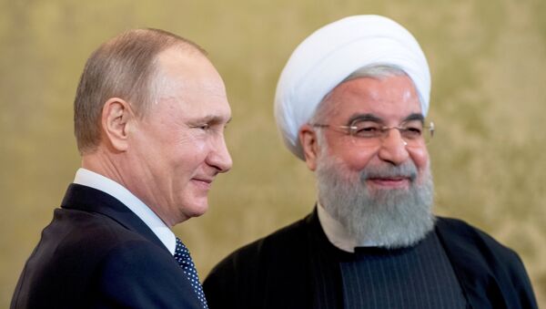 Presidente de Rusia, Vladímir Putin, y presidente de Irán, Hasán Rohani - Sputnik Mundo