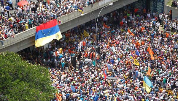A general view shows an opposition rally in Caracas, Venezuela - Sputnik Mundo