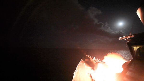 In this image provided by the U.S. Navy, the guided-missile destroyer USS Porter (DDG 78) launches a tomahawk land attack missile in the Mediterranean Sea - Sputnik Mundo