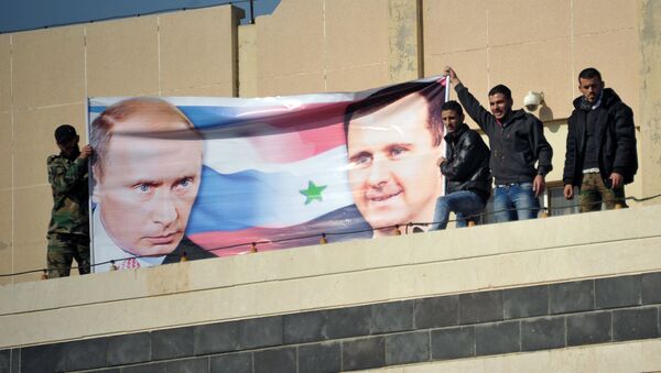 Los retratos de Vladímir Putin y Bashar Asad en Siria (archivo) - Sputnik Mundo