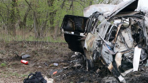 Lugar de explosión de un coche de la OSCE - Sputnik Mundo
