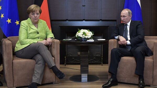 Angela Merkel, canciller de Alemania, y Vladímir Putin, presidente de Rusia - Sputnik Mundo
