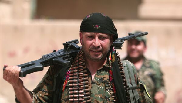 Combatiente kurdo del YPG (archivo) - Sputnik Mundo