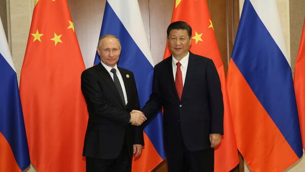 Xi Jinping, presidente de China y Cladímir Putin, presidente de Rusia (archivo) - Sputnik Mundo
