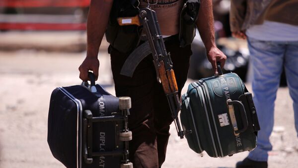 Los radicales y sus familiares abandonan Homs, Siria (archivo) - Sputnik Mundo