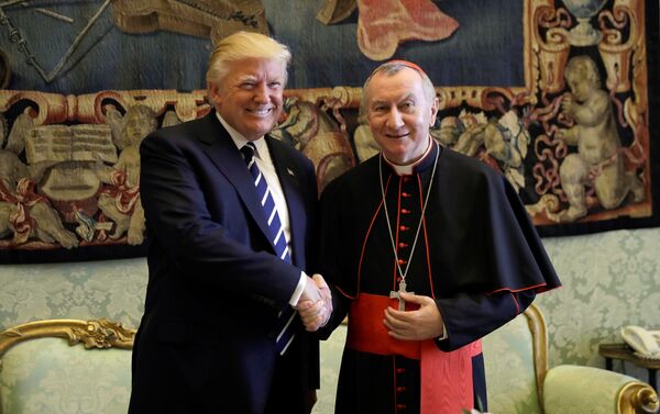Donald Trump, presidente de EEUU, y el Secretario del Vaticano, Pietro Parolin - Sputnik Mundo