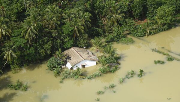 Casa inundada en Matara, Sri Lanka - Sputnik Mundo
