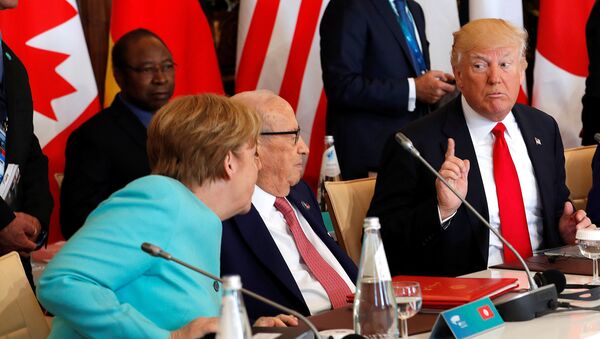 Canciller de Alemania, Angela Merkel, y presidente de EEUU, Donald Trump - Sputnik Mundo