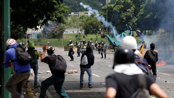 Enfrentamientos en Venezuela - Sputnik Mundo