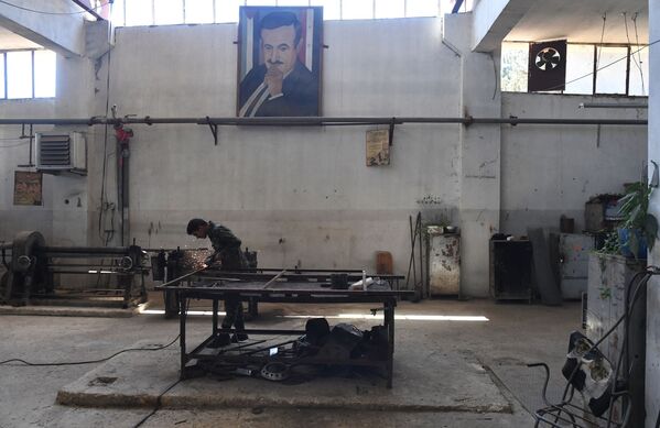 Producción de proyectiles en una planta militar en Siria - Sputnik Mundo