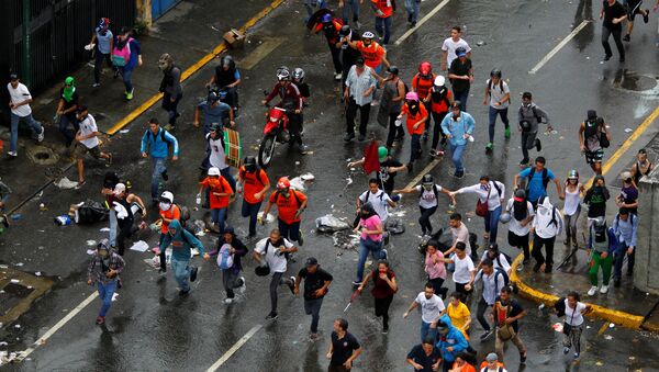 Manifestación opositora en Caracas - Sputnik Mundo