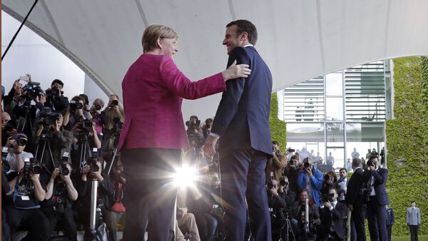 Angela Merkel, canciller de Alemania, y Emmanuel Macron, presidente de Francia - Sputnik Mundo