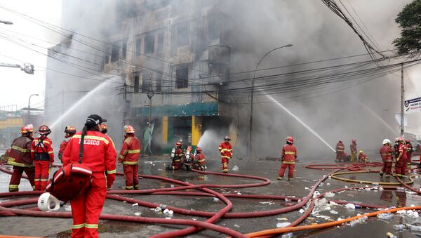 El incendio en 'Galeria Nicolini', Perú - Sputnik Mundo