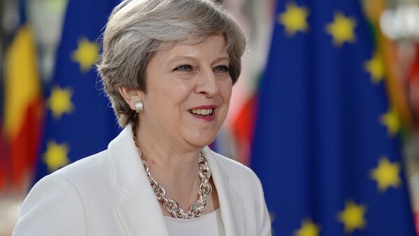 Theresa May, primera ministra de el Reino Unido - Sputnik Mundo
