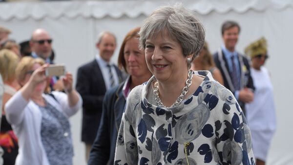 Theresa May, primera ministra de el Reino Unido - Sputnik Mundo