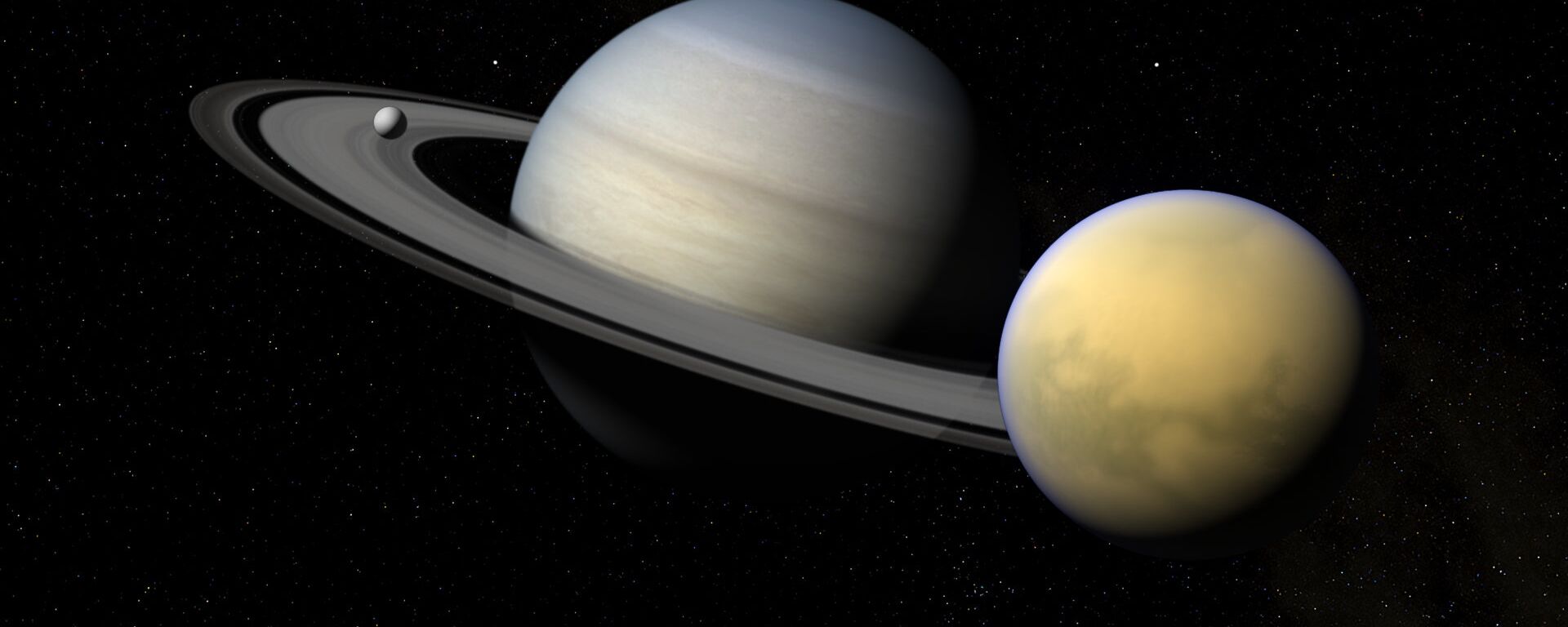 Saturno y sus satélites Titán y Encélado - Sputnik Mundo, 1920, 19.11.2019