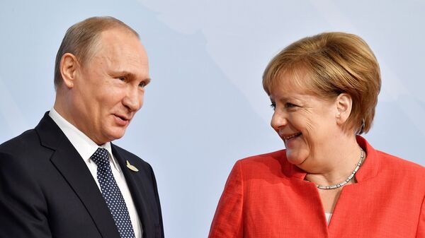 Presidente de Rusia, Vladímir Putin y canciller de Alemania, Angela Merkel - Sputnik Mundo