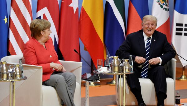 La canciller de Alemania, Angela Merkel, y el presidente de EEUU, Donald Trump - Sputnik Mundo