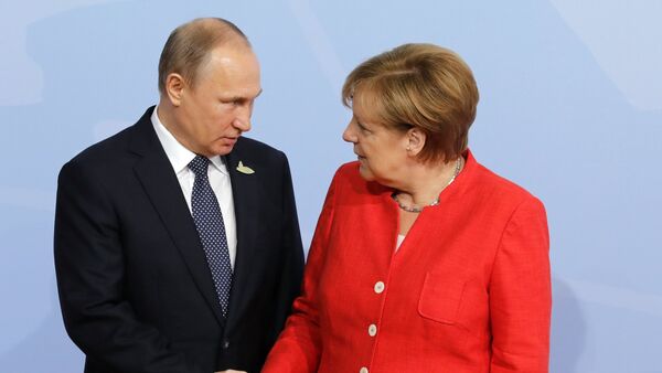 El presidente de Rusia Vladímir Putin y la canciller alemana Angela Merkel - Sputnik Mundo