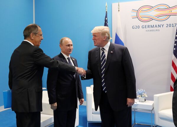 Cara a cara: el primer encuentro entre Putin y Trump - Sputnik Mundo