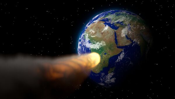 Un asteroide se dirige hacia la Tierra (imagen referencial) - Sputnik Mundo