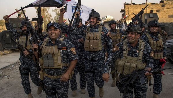 Policía Federal de Irak celebra la liberación de Mosul - Sputnik Mundo