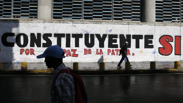 Un graffiti en Caracas en apoyo a las elecciones de la Asamblea Constituyente - Sputnik Mundo