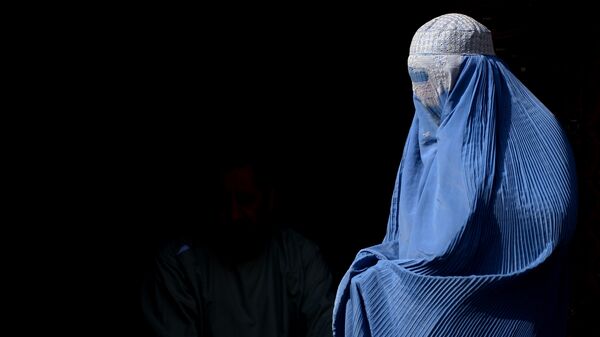 Una mujer en burka (imagen referencial) - Sputnik Mundo